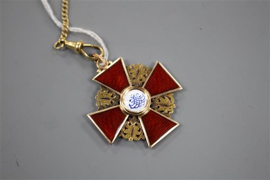 An early 20th century Russian 56 zolotnik yellow metal and enamel cross pendant and an associated 18ct chain, pendant 34mm.
